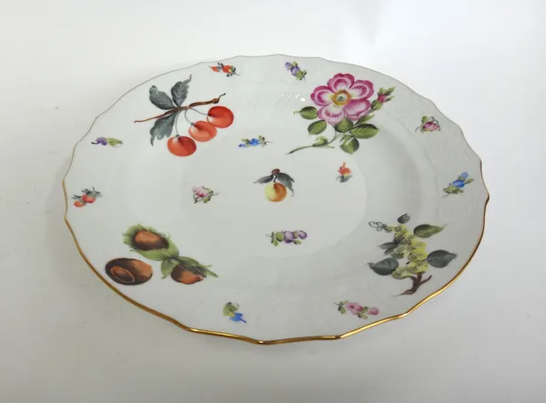 Seventeen Herend porcelain dessert plates, 20th century, hand painted with mushrooms, fruits, berries and flowers, within a relief moulded and shaped