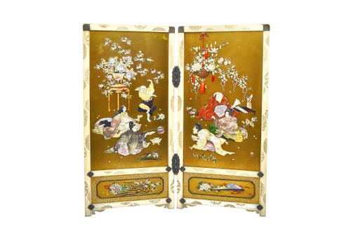 A good Japanese Shibayama inlaid ivory two-fold table screen (Tsuitate), Meiji period, inlaid in ivory, red lacquer and  mother-of-pearl with three se