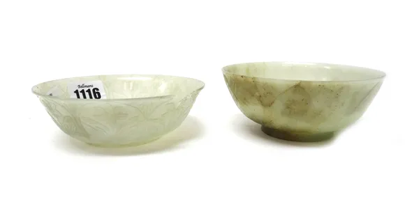 A pale celadon jade bowl, probably Chinese for the Mughul market, 17th/18th century, the gently flared sides carved with lappet panels enclosing flowe