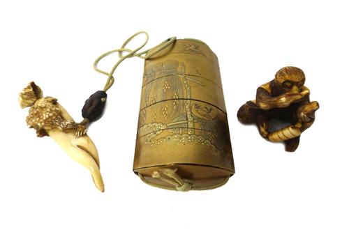 A Japanese four-case gold lacquer inro, Meiji period, decorated in low relief with birds amongst sheaves of wheat, 7.5cm. high, with an iron ojime and