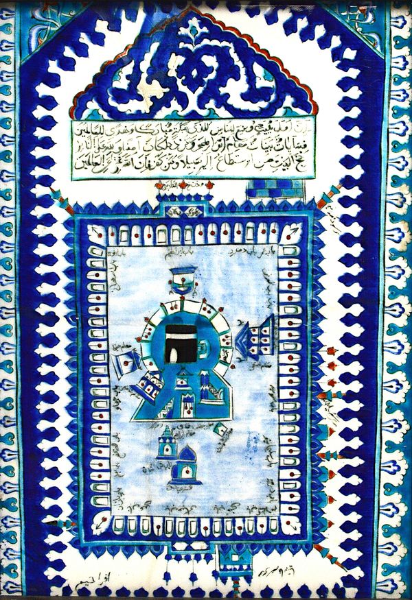 An Iznik pottery tile panel, Turkey, probably 17th century, painted in red, green, cobalt blue and turquoise with a `birds-eye ' view of the Masjid al