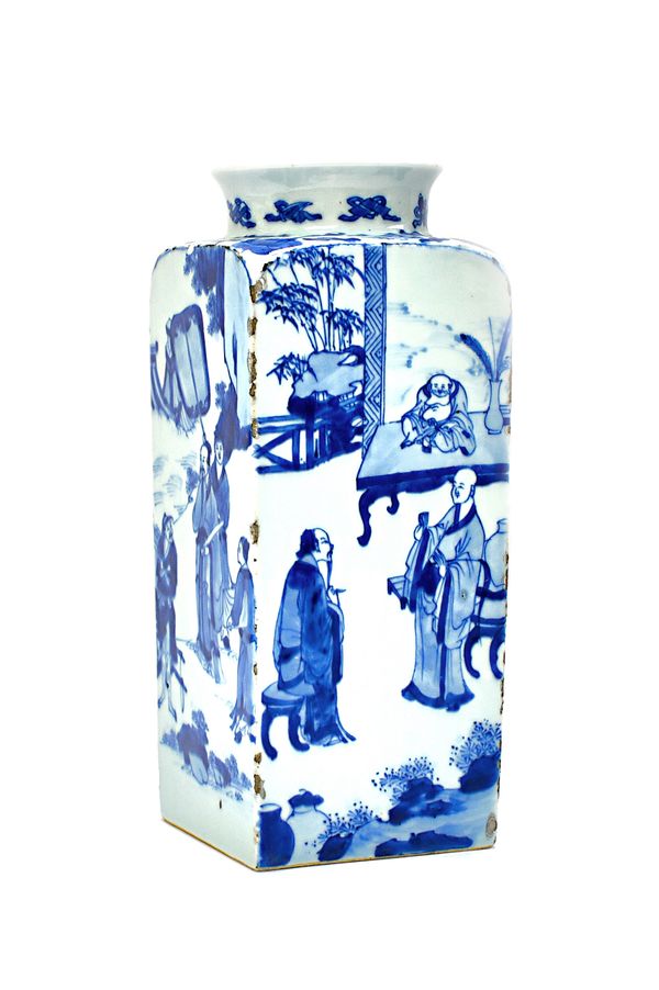A Chinese blue and white flask, Kangxi, of square section, each side painted with  figurative scenes, the shoulders painted with birds and lotus benea