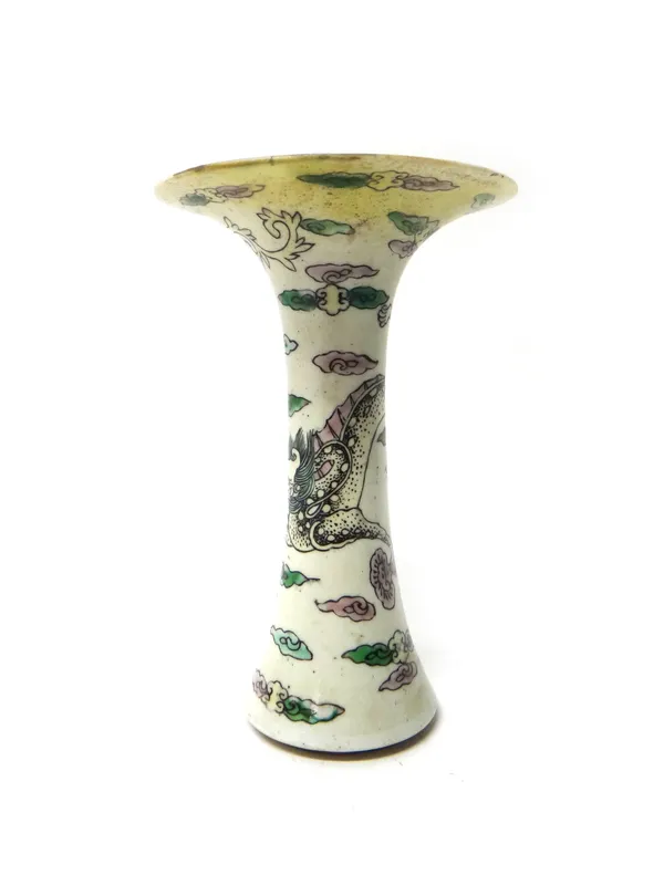 A small Chinese famille-verte vase, probably 19th century, of slender waisted form with wide everted rim, painted with a dragon amongst cloud scrolls,