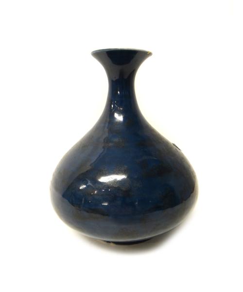 A Chinese blue ground vase, Qianlong blue seal mark but later, of squat form with waisted neck, painted in black with figures in a landscape against a