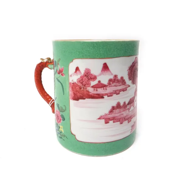 A Chinese export green ground cylindrical mug, late Qianlong/Jiaqing, painted in puce monochrome with an extensive river landscape against an apple-gr