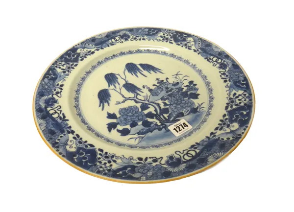 A Chinese export blue and white large plate, Qianlong, painted in the centre with a willow tree, flowering peony and auspicious objects, beneath an el