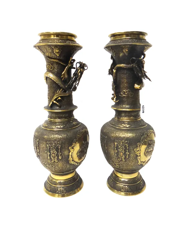 A pair of Chinese polished bronze `dragon' vases, circa 1900, each  bulbous body decorated with two raised panels enclosing dragons against a leiwen g