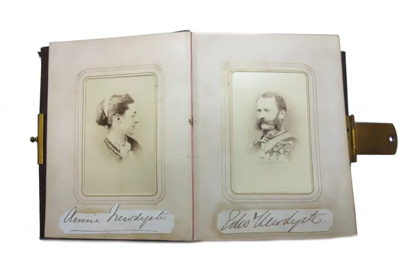 PHOTOGRAPHS - approx. 49 carte de visite in a small 8vo. decorative album, appears to be a mixture of known personages & family members, with a milita