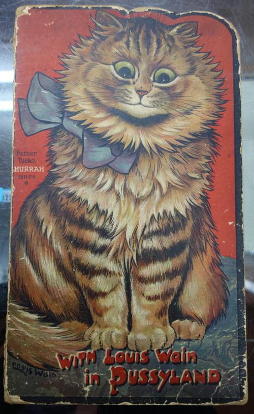 WAIN (L.)  With Louis Wain in Pussyland.  4 full-page coloured & 13 b/w. text illus.; (16)pp. orig. coloured pictorial board covers, 4to. (? ca. 1910)