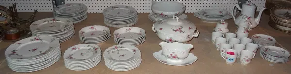 Limoges; a large quantity of tea and dinner wares, with floral decoration on white backgrounds, (qty). S4