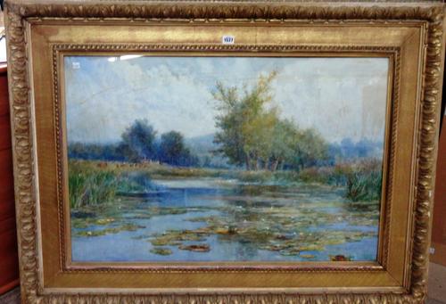 Edward Renard (19th/20th century), Lily pond with cattle grazing beyond, watercolour, signed and dated 1907, 60cm x 90cm.