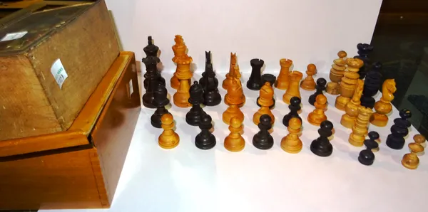 Two turned wooden chess sets, each in a wooden box, (2). CAB