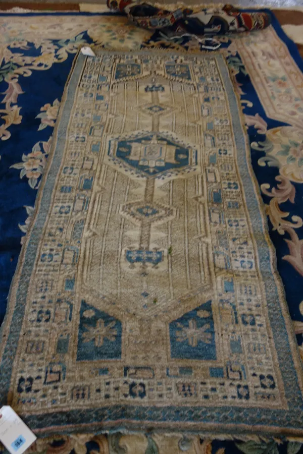 A North West Persian runner, 200cm x 89cm. F7