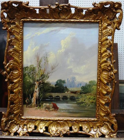 Edward H. Niemann (fl.1863-1887), Cattle watering near a bridge, oil on canvas, signed and dated '87, 24cm x 18cm.