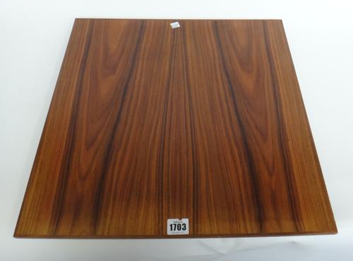 Linley, 20th century;a square walnut table top plinth, on semi-elliptic bun feet, 47cm wide x 2.5cm high.