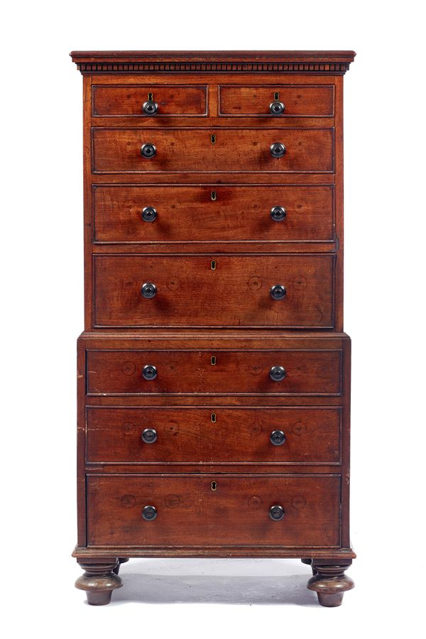 An early 19th century mahogany diminutive chest on chest, the dentil cornice over two short and six long graduated drawers, on bun feet, 48cm wide x 9
