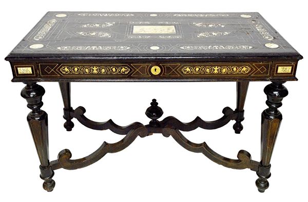 A 19th century Italian ivory inlaid ebonised centre table, possibly Milanese, with single frieze drawer on tapering octagonal supports united by shape