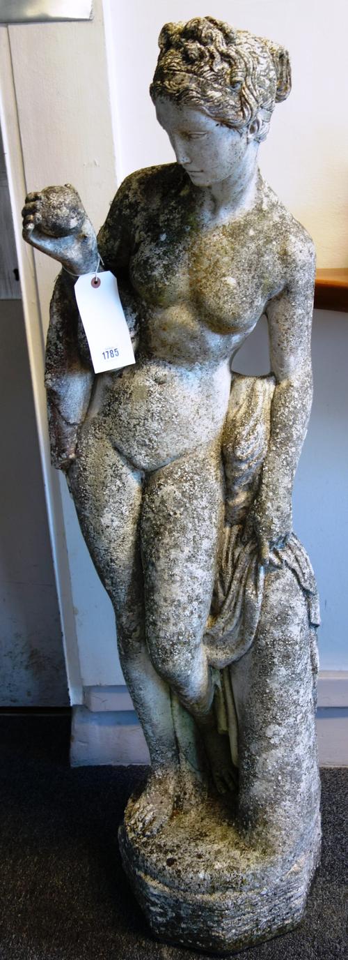 A reconstituted figure of Pomona on shaped circular base, 35cm wide x 128cm high.  Illustrated