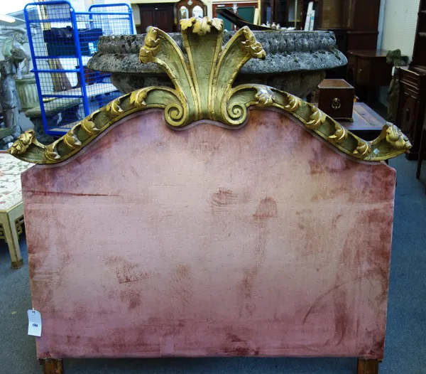 A 19th century Italian gilt framed bed head, with bold relief acanthus carving, 153cm wide x 152cm high.