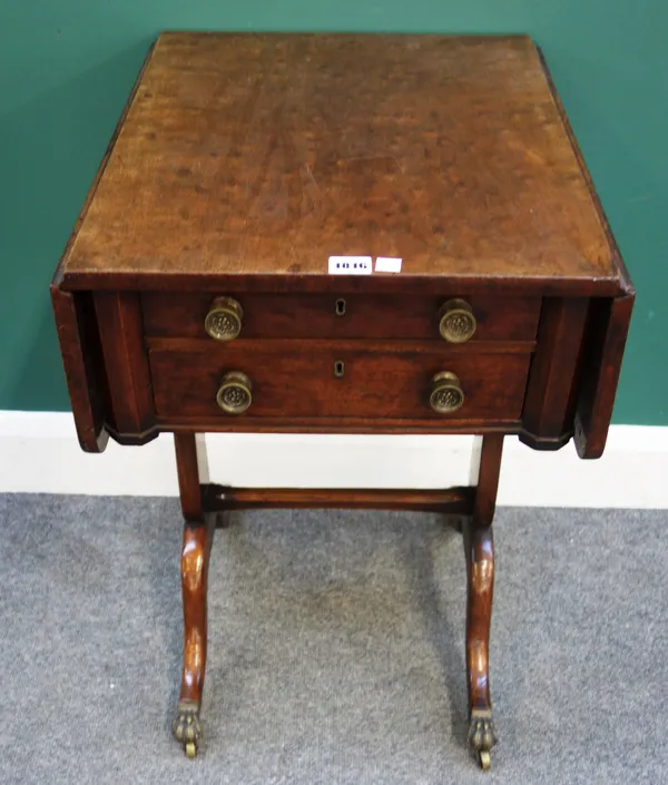 A late George III mahogany drop flap work table, with pair of frieze drawers, one fitted, on a pair of trestle end standards, 43cm wide x 76cm wide op