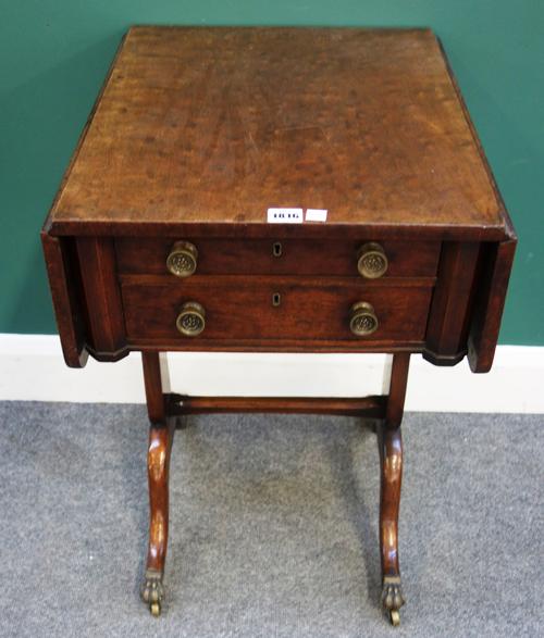 A late George III mahogany drop flap work table, with pair of frieze drawers, one fitted, on a pair of trestle end standards, 43cm wide x 76cm wide op