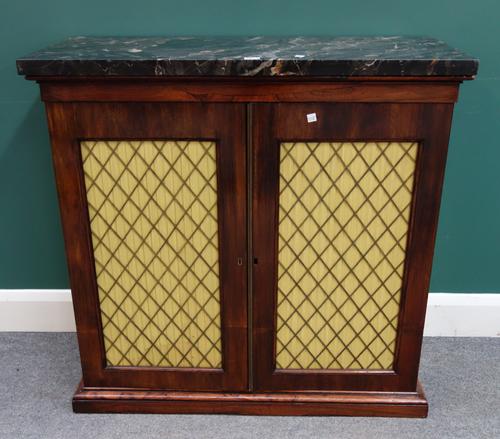 A William IV side cabinet, the rectangular marble top over a rosewood base with pair of brass grille doors, on plinth base, 93cm wide x 90cm high x 42