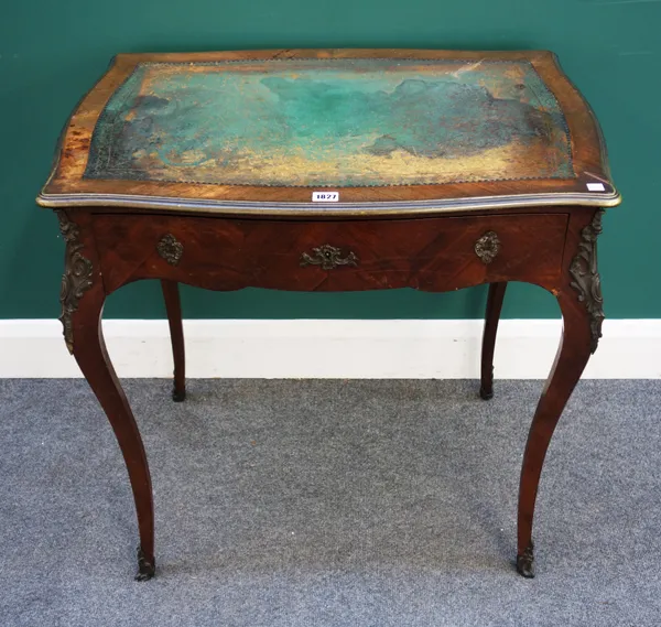A late 19th century French gilt metal mounted writing desk, the serpentine leather inset top over single frieze drawer, on cabriole supports, 75cm wid