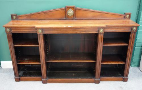 A late Regency gilt metal mounted floor standing breakfront open bookcase, with architectural back and plinth base, 190cm x 117cm high x 43cm deep.