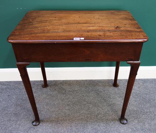 A George III mahogany centre table with rounded rectangular top over pair of end frieze drawers, on club supports, 76cm wide x 72cm high x 51cm deep.