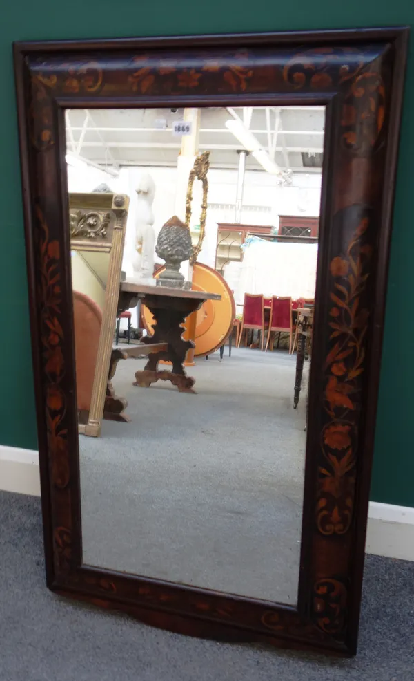 A William and Mary style marquetry inlaid cushion framed rectangular wall mirror, 19th century, 67cm wide x 117cm high.