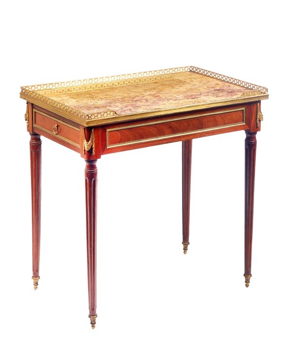 A 19th century French gilt bronze mounted mahogany writing table, the galleried rectangular marble top over pair of opposing end frieze drawers on tap