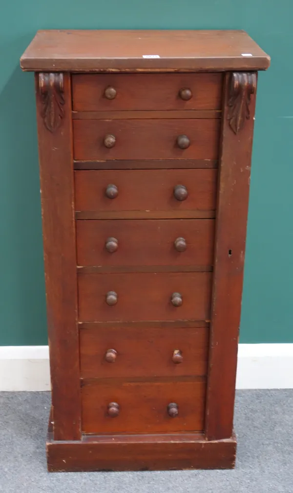 A Victorian mahogany Wellington chest, the side locking bar enclosing seven graduated drawers, on plinth base, 48cm wide x 103cm high x 33cm deep.