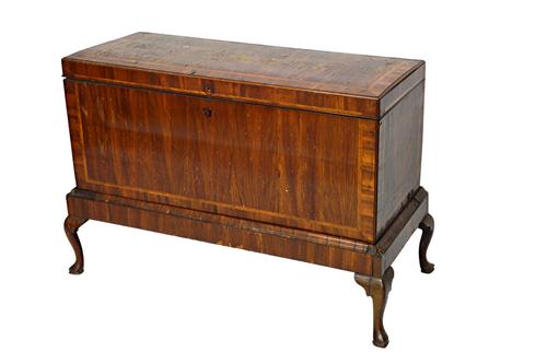An early 18th century chevron banded cherry wood rectangular lift-top trunk on stand, 113cm wide x 80cm high.