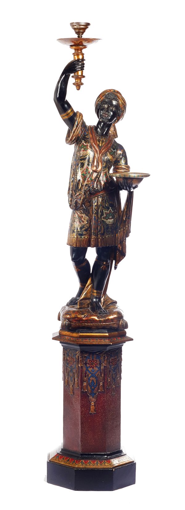 A late 19th century lamp modelled as a figure of a standing Blackamoor holding a torch, on stepped octagonal base, 204cm high.  Illustrated