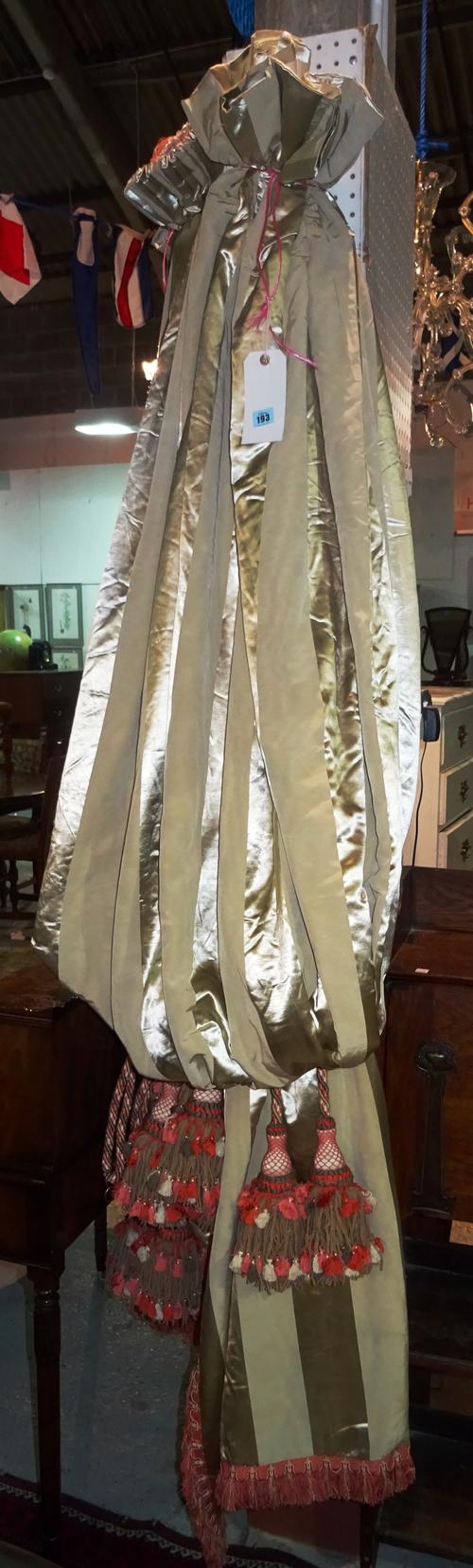 Curtains; a group of three single curtains, lined and interlined, gold striped one with additional coloured reverse, to include six tie backs, each me