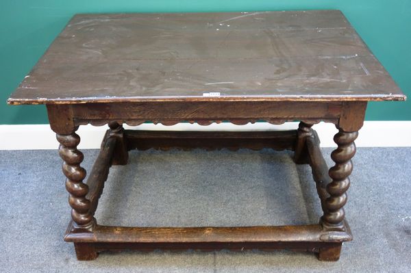 A 17th century and later oak centre table, with shaped frieze and barleytwist supports, united by perimeter stretcher, 120cm wide x 86cm deep x 75cm h