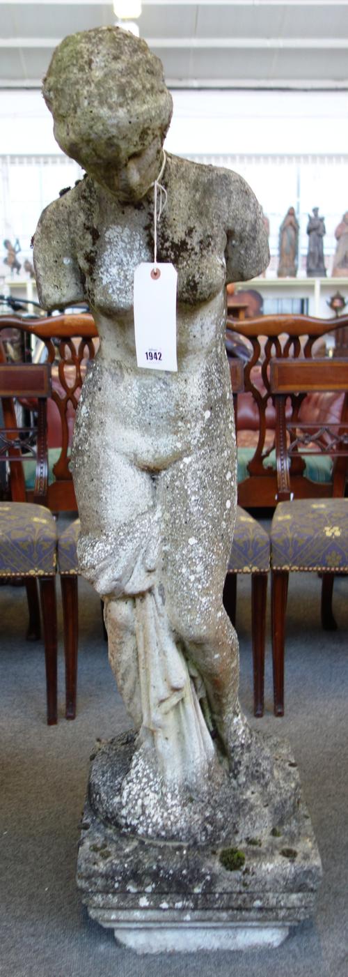 A reconstituted stone figure of Venus de Milo, on stepped square base, the figure 30cm wide x 107cm high.