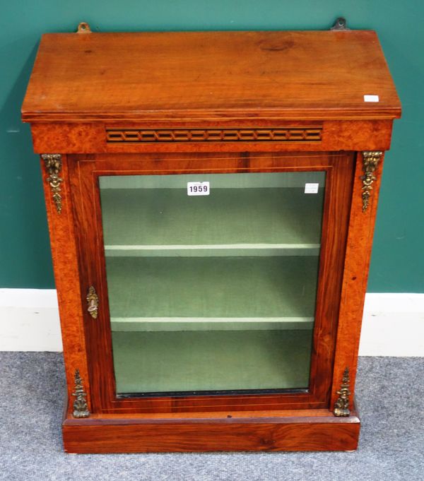 A miniature Victorian gilt metal mounted figured walnut pier cabinet, 52cm wide x 68cm high x 26cm deep.