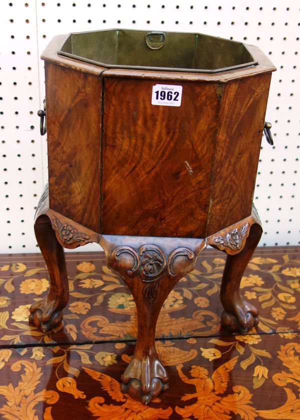 An early 20th century figured walnut Anglo-Dutch octagonal wine cooler/jardiniere, on four claw and ball feet, 36cm wide x 41cm high.