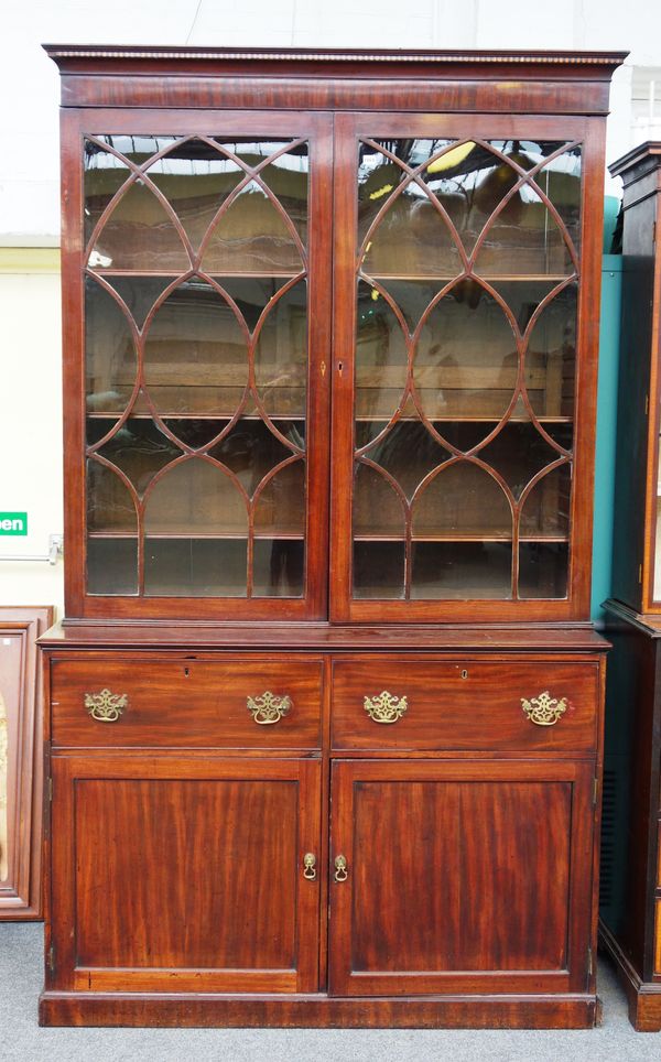 A George III inlaid mahogany secretaire cabinet, with pair of astragal glazed doors over two short drawers one with fitted interior and a further pair