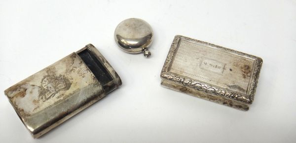 Silver, comprising; a slide action vesta box of curved rectangular form, detailed 'The Times 1926', by Goldsmiths and Silversmiths Company Ltd, London