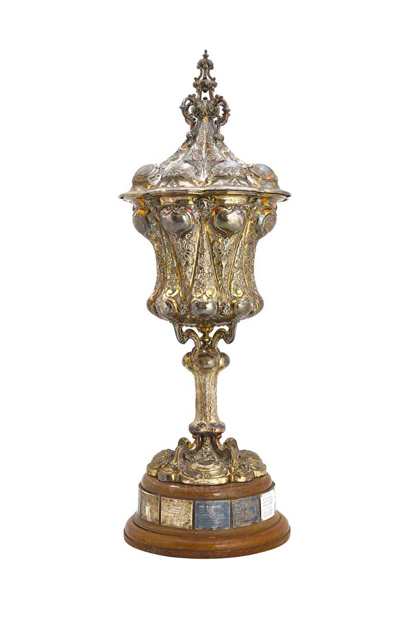 A large early Victorian silver gilt cup and cover, by Robert  Garrard, London 1846, boldly decorated in the Renaissance style, with tapered embossed p