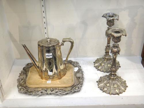 Plated wares, comprising; a Victorian coffee pot, of tapered shaped oval form, a pair of Elkington & Co table candlesticks, with bold foliate decorati