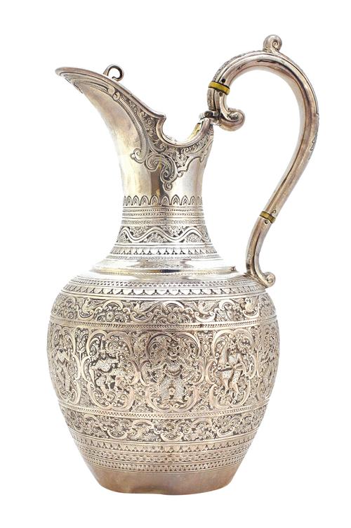 A Victorian Scottish silver four piece tea set, comprising; a teapot, a hot water jug, a sugar bowl and a milk jug, each piece decorated with Far East