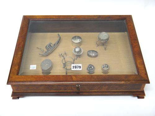 A model of a Venetian gondola, detailed '800', a silver circular box and cover decorated with two mice and a wedge of cheese, an oval hinge lidded box