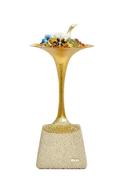 A silver and silver gilt limited edition ornamental mushroom, a goose amongst leaves and flowers, decorated with semi-precious stones theme, raised on