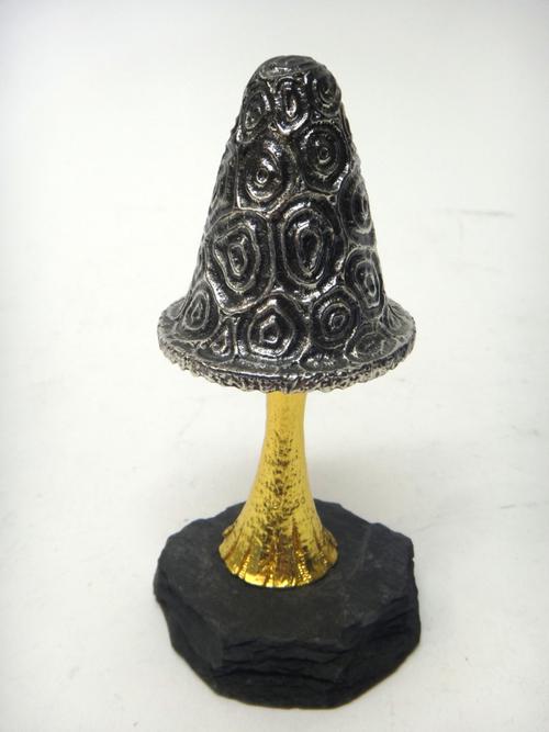 A silver and silver gilt limited edition ornamental mushroom, Carol Singers theme, raised on a slate base, London 1982, maker C.N. Lawrence, height 15