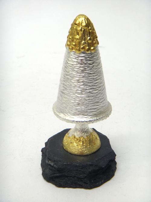 A silver and silver gilt limited edition ornamental mushroom, Sawing down the egg theme, raised on a slate base, London 1984, maker C.N. Lawrence, hei