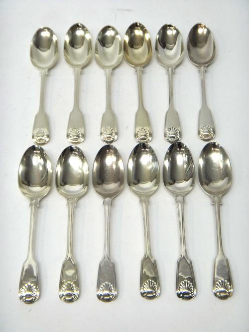 Twelve Victorian silver double struck, fiddle thread and shell pattern tablespoons, including four London 1851, four London 1843, two London 1875 and
