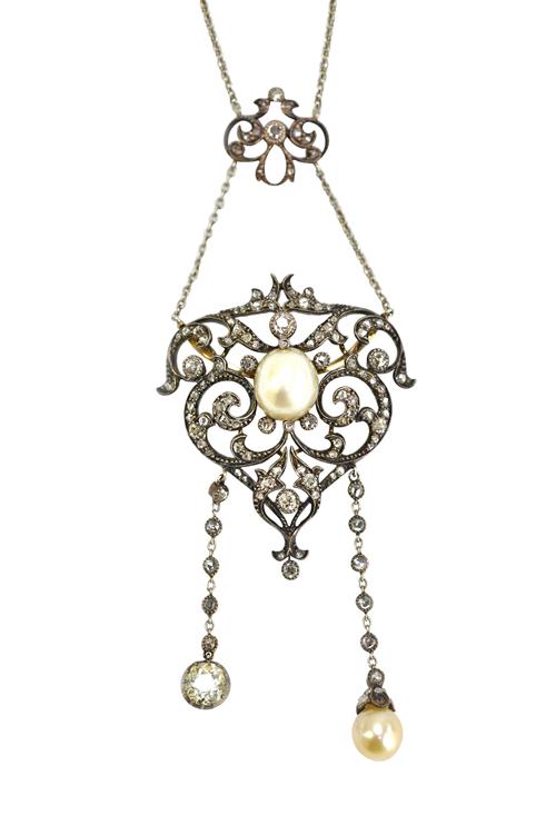 A late Victorian diamond and cultured pearl pendant necklace, the front of tapered form, in a scroll pierced design, centred by a cultured pearl and o